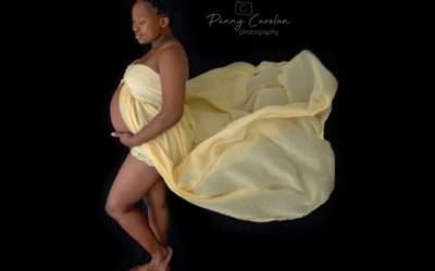 Maternity shoot carrying twins